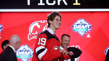 VANCOUVER, BRITISH COLUMBIA - JUNE 21: Jack Hughes smiles after being selected first overall by the New Jersey Devils during the first round of the 2019 NHL Draft at Rogers Arena on June 21, 2019 in Vancouver, Canada. (Photo by Bruce Bennett/Getty Images)