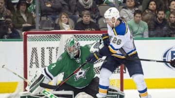 Dec 27, 2015; Dallas, TX, USA; Dallas Stars goalie Kari Lehtonen (32) defends against St. Louis Blues center Paul Stastny (26) during the third period at the American Airlines Center. The Stars shut out the Blues 3-0. Mandatory Credit: Jerome Miron-USA TODAY Sports