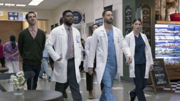 NEW AMSTERDAM -- "TBD" Episode 501 -- Pictured: (l-r) Conner Marx as Ben Meyer, Jocko Sims as Dr. Floyd Reynolds, Ryan Eggold as Dr. Max Goodwin, Janet Montgomery as Dr. Lauren Bloom -- (Photo by: Eric Liebowitz/NBC)