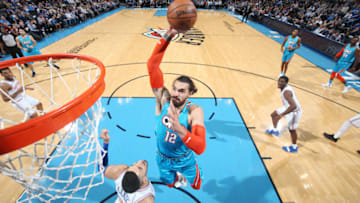 OKLAHOMA CITY, OK- NOVEMBER 14: Steven Adams #12 of the Oklahoma City Thunder dunks the ball against the New York Knicks on November 14, 2018 at Chesapeake Energy Arena in Oklahoma City, Oklahoma. NOTE TO USER: User expressly acknowledges and agrees that, by downloading and or using this photograph, User is consenting to the terms and conditions of the Getty Images License Agreement. Mandatory Copyright Notice: Copyright 2018 NBAE (Photo by Joe Murphy/NBAE via Getty Images)
