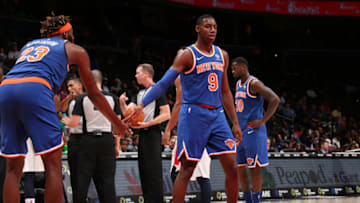 WASHINGTON, DC -¬ OCTOBER 7: Mitchell Robinson #23 of New York Knicks high-fives RJ Barrett #9 of New York Knicks against the Washington Wizards during pre-season on October 7, 2019 at Capital One Arena in Washington, DC. NOTE TO USER: User expressly acknowledges and agrees that, by downloading and or using this Photograph, user is consenting to the terms and conditions of the Getty Images License Agreement. Mandatory Copyright Notice: Copyright 2019 NBAE (Photo by Ned Dishman/NBAE via Getty Images)