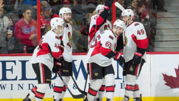 Mar 26, 2016; Ottawa, Ontario, CAN; Ottawa Senators defenseman Erik Karlsson (65) celebrates with team his goal scored in the second period against the Anaheim Ducks at the Canadian Tire Centre. Mandatory Credit: Marc DesRosiers-USA TODAY Sports