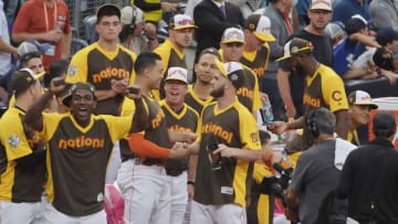Jul 11, 2016; San Diego, CA, USA; National League outfielder Giancarlo Stanton (27) of the Miami Marlins celebrates with teammates after winning the All Star Game home run derby at PetCo Park. Mandatory Credit: Kirby Lee-USA TODAY Sports