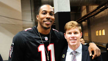 ATLANTA, GA - JANUARY 22: NBA player Dwight Howard of the Atlanta Hawks poses with Craig Sager Jr. before the NFC Championship Game between the Green Bay Packers and the Atlanta Falcons at the Georgia Dome on January 22, 2017 in Atlanta, Georgia. (Photo by Scott Cunningham/Getty Images)