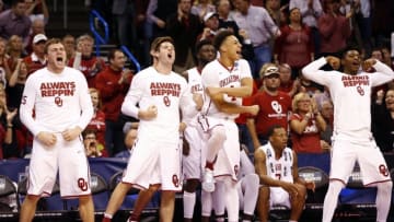 Mar 18, 2016; Oklahoma City, OK, USA; Oklahoma Sooners center Jamuni McNeace (4) reacts with teammates on the bench in the first half against the Cal State Bakersfield Roadrunners during the first round of the 2016 NCAA Tournament at Chesapeake Energy Arena. Mandatory Credit: Kevin Jairaj-USA TODAY Sports