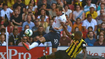 Tottenham Hotspur's English striker Harry Kane (L) vies with Watford's Zaire-born Belgian defender Christian Kabasele (R) during the English Premier League football match between Watford and Tottenham Hotspur at Vicarage Road Stadium in Watford, north of London on September 2, 2018. (Photo by OLLY GREENWOOD / AFP) / RESTRICTED TO EDITORIAL USE. No use with unauthorized audio, video, data, fixture lists, club/league logos or 'live' services. Online in-match use limited to 120 images. An additional 40 images may be used in extra time. No video emulation. Social media in-match use limited to 120 images. An additional 40 images may be used in extra time. No use in betting publications, games or single club/league/player publications. / (Photo credit should read OLLY GREENWOOD/AFP/Getty Images)