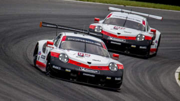 LAKEVILLE, CT- JUL 20: The #912 Porsche 911 RSR of Earl Bamber, of New Zealand, and Laurens Vanthoor, of Belgium, leads the #911 Porsche 911 RSR of Nick Tandy, of Great Britain, and Patrick Pilet, of France, during the Northeast Grand Prix, IMSA WeatherTech Series Race, July 20, 2019. (Photo by Brian Cleary/Getty Images)