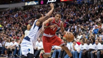 Dec 14, 2013; Dallas, TX, USA; Dallas Mavericks shooting guard Wayne Ellington (21) guards Milwaukee Bucks shooting guard Giannis Antetokounmpo (34) during the second half at American Airlines Center. The Mavericks defeated the Bucks 106-93. Mandatory Credit: Jerome Miron-USA TODAY Sports