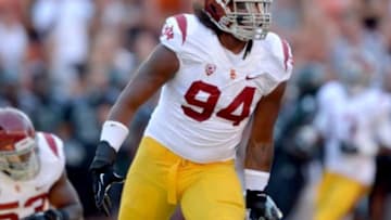 Aug 29, 2013; Honolulu, HI, USA; Southern California Trojans defensive end Leonard Williams (94) celebrates after a sack in the second quarter against the Hawaii Rainbow Warriors at Aloha Stadium. Mandatory Credit: Kirby Lee-USA TODAY Sports