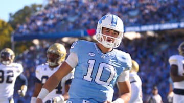 Nov 5, 2016; Chapel Hill, NC, USA; North Carolina Tar Heels quarterback Mitch Trubisky (10) goes into the end zone after scoring a forth quarter touchdown run against the Georgia Tech Yellow Jackets at Kenan Memorial Stadium. The North Carolina Tar Heels defeated the Georgia Tech Yellow Jackets 48-20. Mandatory Credit: James Guillory-USA TODAY Sports