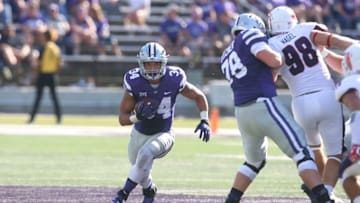 Sep 17, 2016; Manhattan, KS, USA; Kansas State Wildcats running back Alex Barnes (34) follows the block of offensive lineman Bryce Fitzner (78) during a game against the Florida Atlantic Owlsat Bill Snyder Family Football Stadium. The Wildcats won the game 63-7. Mandatory Credit: Scott Sewell-USA TODAY Sports