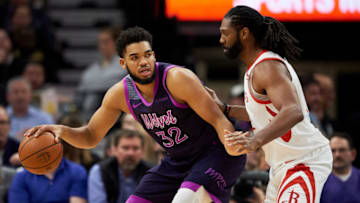 MINNEAPOLIS, MN - FEBRUARY 13: Nene Hilario #42 of the Houston Rockets defends against Karl-Anthony Towns #32 of the Minnesota Timberwolves. (Photo by Hannah Foslien/Getty Images)