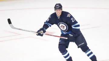 Oct 19, 2016; Winnipeg, Manitoba, CAN; Winnipeg Jets right wing Patrik Laine (29) skates through the middle during the second period against Toronto Maple Leafs at MTS Centre. Mandatory Credit: Bruce Fedyck-USA TODAY Sports