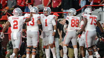 LINCOLN, NE - SEPTEMBER 28: Quarterback Justin Fields #1 of the Ohio State Buckeyes celebrates a touchdown with running back J.K. Dobbins #2 and offensive lineman Jonah Jackson #73 and tight end Jeremy Ruckert #88 and offensive lineman Thayer Munford #75 against the Nebraska Cornhuskersat Memorial Stadium on September 28, 2019 in Lincoln, Nebraska. (Photo by Steven Branscombe/Getty Images)