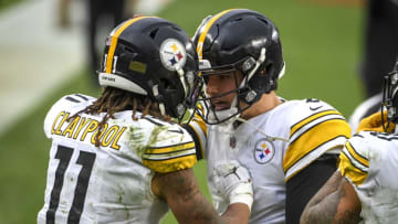 CLEVELAND, OHIO - JANUARY 03: Chase Claypool #11 of the Pittsburgh Steelers celebrates his touchdown with Mason Rudolph #2 of the Pittsburgh Steelers against the Cleveland Browns in the fourth quarter at FirstEnergy Stadium on January 03, 2021 in Cleveland, Ohio. (Photo by Nic Antaya/Getty Images)