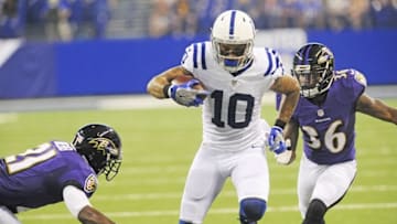 Aug 20, 2016; Indianapolis, IN, USA; Indianapolis Colts receiver Donte Moncrief (10) runs past Baltimore Ravens defensive back Lardarius Webb (21) and corner back Jerraud Powers (36) at Lucas Oil Stadium. Mandatory Credit: Thomas J. Russo-USA TODAY Sports