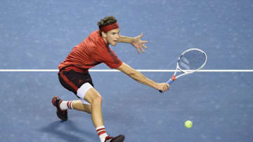 TOKYO, JAPAN - OCTOBER 03: Dominic Thiem of Austria plays a backhand against Steve Johnson of the USA during day two of the Rakuten Open at Ariake Coliseum on October 3, 2017 in Tokyo, Japan. (Photo by Matt Roberts/Getty Images)