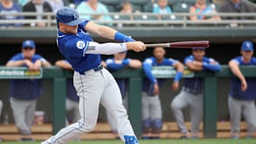 MESA, ARIZONA - MARCH 10: Hunter Dozier #17 of the Kansas City Royals bats against the Oakland Athletics during the MLB spring training game at HoHoKam Stadium on March 10, 2020 in Mesa, Arizona. (Photo by Christian Petersen/Getty Images)