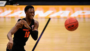 Mar 21, 2021; Indianapolis, Indiana, USA; Oregon State Beavers forward Warith Alatishe (10) passes the ball during the second half in the second round of the 2021 NCAA Tournament against the Oklahoma State Cowboys at Hinkle Fieldhouse. Mandatory Credit: Marc Lebryk-USA TODAY Sports