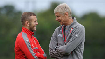 ST ALBANS, ENGLAND - AUGUST 13: Arsenal manager Arsene Wenger talks to Jack Wilshere during a training session on August 13, 2016 in St Albans, England. (Photo by Stuart MacFarlane/Arsenal FC via Getty Images)