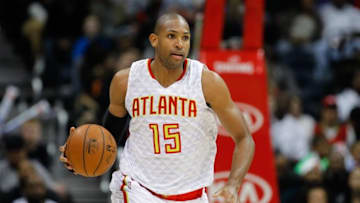 Feb 28, 2016; Atlanta, GA, USA; Atlanta Hawks center Al Horford (15) dribbles against the Charlotte Hornets in the third quarter at Philips Arena. The Hawks defeated the Hornets 87-76. Mandatory Credit: Brett Davis-USA TODAY Sports