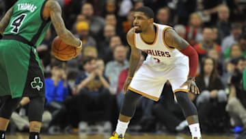 Mar 5, 2016; Cleveland, OH, USA; Cleveland Cavaliers guard Kyrie Irving (2) and Boston Celtics guard Isaiah Thomas (4) during the first quarter at Quicken Loans Arena. Mandatory Credit: Ken Blaze-USA TODAY Sports