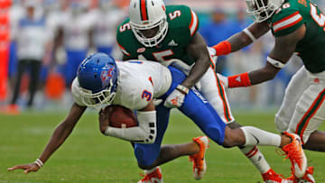 MIAMI GARDENS, FL - SEPTEMBER 8: Amari Carter #5 of the Miami Hurricanes sacks D'Vonn Gibbons #3 of the Savannah State Tigers on September 8, 2018 at Hard Rock Stadium in Miami Gardens, Florida.(Photo by Joel Auerbach/Getty Images)