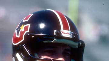 TAMPA, FL - MARCH 3: Quarterback Jim Kelley #12 of the Houston Gamblers looks on against the Tampa Bay Bandits March 3, 1985 during an USFL football game at Tampa Stadium in Tampa, Florida. Kelly played for the Gamblers from 1984-85. (Photo by Focus on Sport/Getty Images)
