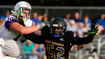 Auburn footballJohn Carroll Catholic’s defensive lineman Wilky Denaud (52) makes a tackle against Fort Pierce Central in a spring football game Thursday, May 19, 2022, in Fort Pierce. John Carroll Catholic won 34-7.Tcn Spring Football Notebook 2