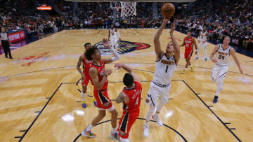 Michael Porter Jr. #1 of the Denver Nuggets shoots against JJ Redick #4 of the New Orleans Pelicans (Photo by Jonathan Bachman/Getty Images)