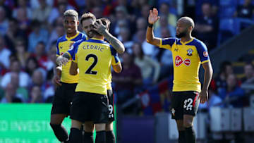 LONDON, ENGLAND - SEPTEMBER 01: Danny Ings of Southampton celebrates with teammate Cedric Soares after scoring his team's first goal during the Premier League match between Crystal Palace and Southampton FC at Selhurst Park on September 1, 2018 in London, United Kingdom. (Photo by Christopher Lee/Getty Images)