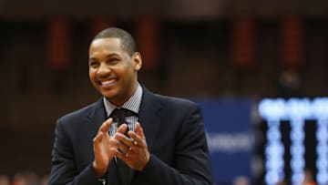SYRACUSE, NY - FEBRUARY 23: Former Syracuse Orange player Carmelo Anthony smiles as his number is retired during a ceremony at half time during the game against the Georgetown Hoyas at the Carrier Dome on February 23, 2013 in Syracuse, New York. (Photo by Nate Shron/Getty Images)