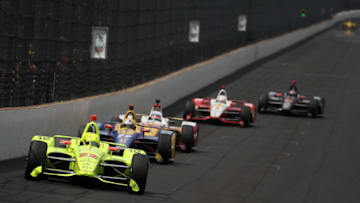 INDIANAPOLIS, INDIANA - MAY 26: Simon Pagenaud of France, driver of the #22 Menards Team Penske Chevrolet races Alexander Rossi of the United States, driver of the #27 NAPA Auto Parts Andretti Autosport Honda during the 103rd running of the Indianapolis 500 at Indianapolis Motor Speedway on May 26, 2019 in Indianapolis, Indiana. (Photo by Chris Graythen/Getty Images)