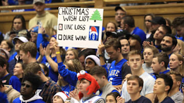 DURHAM, NORTH CAROLINA - DECEMBER 19: A fan of the Duke Blue Devils watches on from the stands during their game against the Wofford Terriers at Cameron Indoor Stadium on December 19, 2019 in Durham, North Carolina. (Photo by Streeter Lecka/Getty Images)