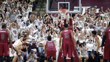 Feb 6, 2016; College Station, TX, USA; Texas A&M Aggie fans try to distract South Carolina Gamecocks forward Michael Carrera (24) during a free throw at Reed Arena. South Carolina won 81-78. Mandatory Credit: Erich Schlegel-USA TODAY Sports
