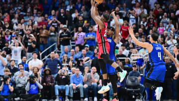 Jimmy Butler #22 of the Miami Heat shoots a three-point shot at the buzzer in the fourth quarter to tie the game against Orlando Magic(Photo by Julio Aguilar/Getty Images)