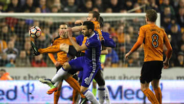WOLVERHAMPTON, ENGLAND - FEBRUARY 18: Jon Dadi Bodvarsson of Wolverhampton Wanderers competes with Cesc Fabregas of Chelsea during the Emirates FA Cup Fifth Round match between Wolverhampton Wanderers and Chelsea at Molineux on February 18, 2017 in Wolverhampton, England. (Photo by Matthew Ashton - AMA/Getty Images)