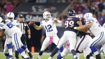 Oct 9, 2014; Houston, TX, USA; Indianapolis Colts quarterback Andrew Luck (12) throws in the pocket against the Houston Texans at NRG Stadium. Mandatory Credit: Matthew Emmons-USA TODAY Sports