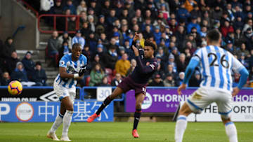 HUDDERSFIELD, ENGLAND - FEBRUARY 09: Alex Iwobi of Arsenal scores his team's first goal during the Premier League match between Huddersfield Town and Arsenal FC at John Smith's Stadium on February 9, 2019 in Huddersfield, United Kingdom. (Photo by Gareth Copley/Getty Images)