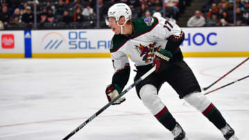 Jan 28, 2023; Anaheim, California, USA; Arizona Coyotes center Nick Bjugstad (17) controls the puck against the Anaheim Ducks during the second period at Honda Center. Mandatory Credit: Gary A. Vasquez-USA TODAY Sports