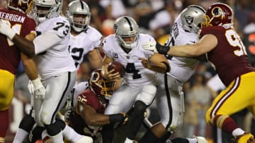 LANDOVER, MD - SEPTEMBER 24: Quarterback Derek Carr (Photo by Patrick Smith/Getty Images)