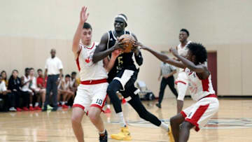 TORONTO, ON - JANUARY 11 - Canadian Internation Basketball Academy forward Matur Maker drives the lane in his team's game against GTA Prep at Lifetime Athletic in Mississauga, January 11, 2018. Matur Maker has announced he'll emulate big brother, Milwaukee Bucks star Thon Maker, and leap straight from a local prep school to the NBA. (Andrew Francis Wallace/Toronto Star via Getty Images)