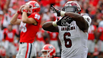 ATHENS, GEORGIA - OCTOBER 12: T.J. Brunson #6 of the South Carolina Gamecocks reacts after a missed field goal by Rodrigo Blankenship #98 of the Georgia Bulldogs in second overtime gave them a 20-17 win at Sanford Stadium on October 12, 2019 in Athens, Georgia. (Photo by Kevin C. Cox/Getty Images)