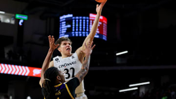 Cincinnati Bearcats forward Jarrett Hensley drives to the basket against East Carolina. USA Today.