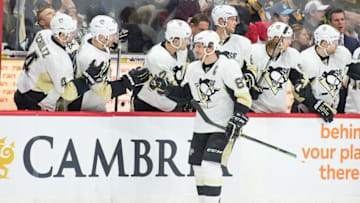 Apr 5, 2016; Ottawa, Ontario, CAN; Pittsburgh Penguins center Sidney Crosby (87) celebrates with team his goal scored in the second period against the Ottawa Senators at the Canadian Tire Centre. Mandatory Credit: Marc DesRosiers-USA TODAY Sports