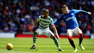 GLASGOW, SCOTLAND - MAY 12: Ryan Kent of Rangers and Jeremy Toljan of Celtic challenge for the ball during the Ladbrokes Scottish Premiership match between Rangers and Celtic at Ibrox Stadium on May 12, 2019 in Glasgow, Scotland. (Photo by Mark Runnacles/Getty Images)