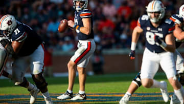 Auburn football quarterback Bo Nix (10) looks to pass against Georgia at Jordan-Hare Stadium in Auburn, Ala., on Saturday, Oct. 9, 2021.