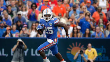 Nov 12, 2016; Gainesville, FL, USA; Florida Gators running back Jordan Scarlett (25) runs with the ball against the South Carolina Gamecocks during the second quarter at Ben Hill Griffin Stadium. Mandatory Credit: Kim Klement-USA TODAY Sports