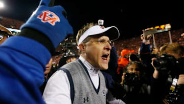 AUBURN, AL - NOVEMBER 30: Head coach Gus Malzahn of the Auburn Tigers celebrates their 34 to 28 win over the Alabama Crimson Tide at Jordan-Hare Stadium on November 30, 2013 in Auburn, Alabama. (Photo by Kevin C. Cox/Getty Images)