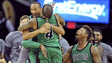 Feb 5, 2016; Cleveland, OH, USA; Boston Celtics guard Avery Bradley (0) celebrates with guard Isaiah Thomas (4) after making a three-point shot to end the game and beat the Cleveland Cavaliers at Quicken Loans Arena. The Celtics won 104-103. Mandatory Credit: Ken Blaze-USA TODAY Sports